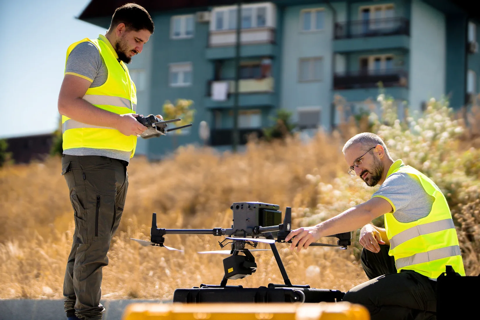 Geobiro team preparing a survey drone.