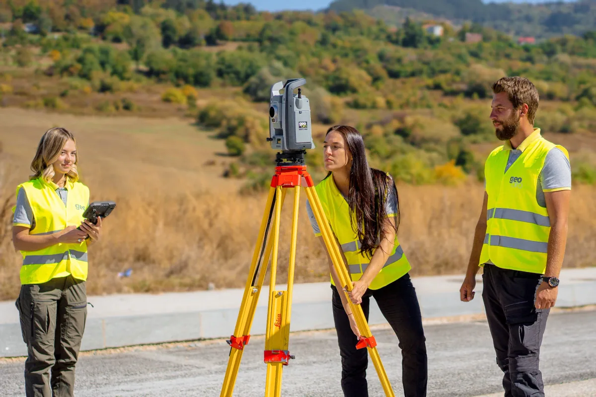 Geobiro field team working with a total station on a surveying project